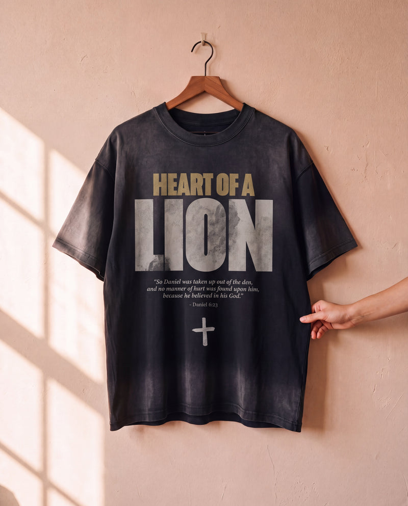 Heart of a Lion faded black tee on a hanger, front print