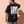 Love Never Ends tee, black, back print edition, man, back print hand on head look over