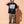 Love Never Ends tee, black, front print, man, hand on neck full body