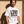 Love Never Ends tee, white, front print, man, three quarter thigh up