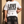 Love Never Ends tee, white, front print, man, chest close up