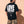 Love Never Ends tee, black, back print edition, man, back print thigh up