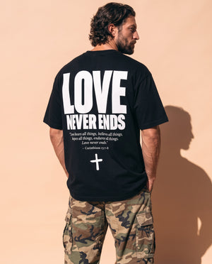 Love Never Ends tee, black, back print edition, man, back print thigh up