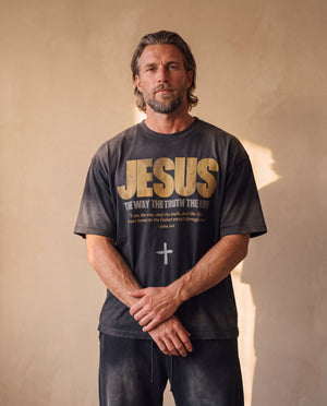 Jesus the Way the Truth the Life faded black tee, front print, man standing with his hands clasped, relaxed oversized fit