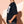 Light Over Darkness tee, black, front print, woman, side profile thigh up