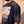 King of Kings faded black tee, close up on a man's shoulder and chest, the KING OF KINGS lettering and verse in sharp focus
