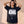 Daughter of the King tee, black, front print, woman, hands in hair thigh up