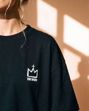 Light Over Darkness tee, black, back print edition, woman, front crown chest close up