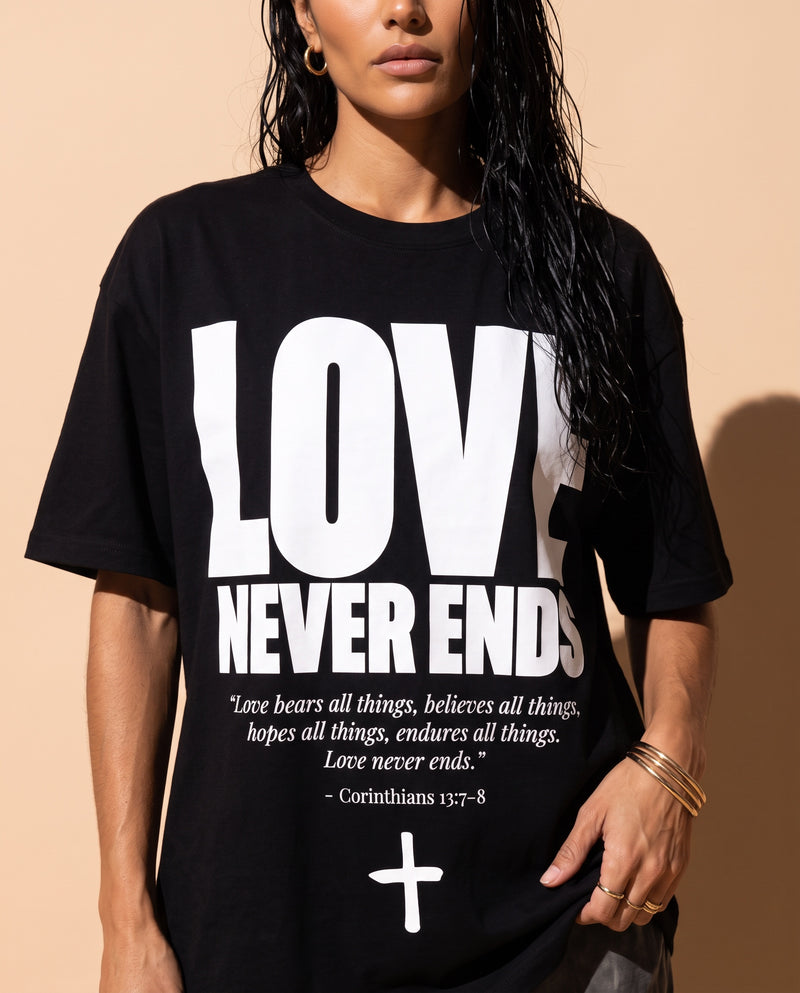 Love Never Ends tee, black, front print, woman, chest close up