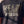 Heart Wide Open faded black tee, close up of the front print on a woman, HEART WIDE OPEN lettering and the Luke 6:45 verse