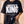 Daughter of the King tee, black, front print, woman, chest close up