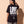 Love Never Ends tee, black, back print edition, woman, back print look over thigh up