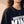 Daughter of the King tee, black, front print, woman, collar close up with gold cross necklace