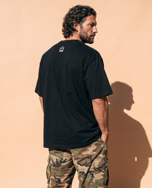 Love Never Ends tee, black, back print, man, back view look over