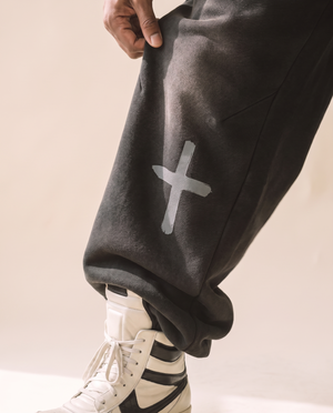 Heavyweight Sweatpants · Black & Off White, smoky black, front print, man, cross closeup