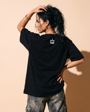 Love Never Ends tee, black, back print, woman, back view hand in hair