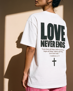 Love Never Ends tee, white, back print edition, woman, back print over shoulder close up