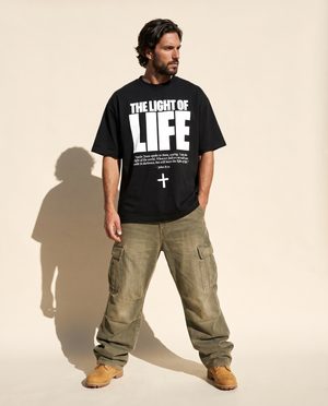 The Light of Life tee, black, front print, man, look away full body