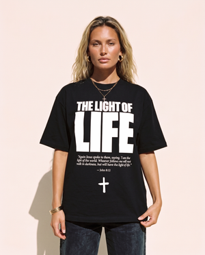 The Light of Life tee, black, front print, woman, standing thigh up