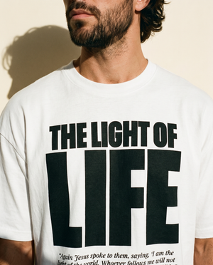 The Light of Life tee, white, front print, man, chest close up