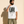 The Light of Life tee, white, front print, man, hand on collar waist up