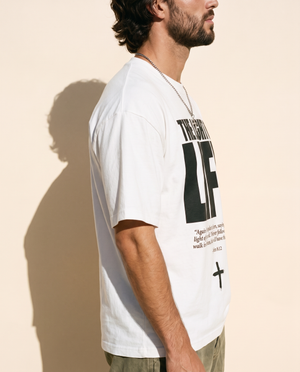 The Light of Life tee, white, front print, man, side profile
