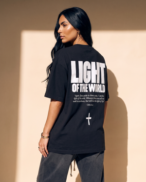 Light of the World tee, black, back print edition, woman, back print over shoulder