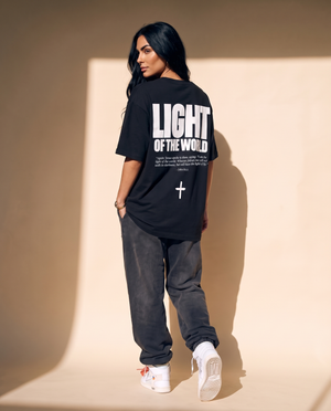 Light of the World tee, black, back print edition, woman, back print walking