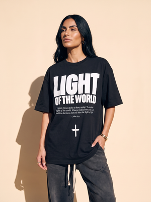 Light of the World tee, black, front print, woman, standing thigh up