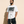 Light of the World tee, white, front print, man, look away thigh up