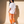 Light of the World tee, white, back print, woman, back view walking