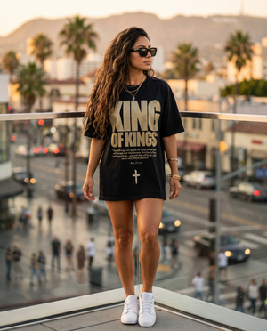 King of Kings – Woman on LA rooftop in black Christian T-Shirt by The Word