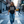In the Beginning God – Woman wearing black Christian T-Shirt by The Word, NYC street
