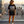 King of Kings – Woman on NYC rooftop wearing The Word black Christian T-Shirt