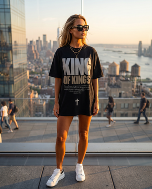 King of Kings – Woman on NYC rooftop wearing The Word black Christian T-Shirt