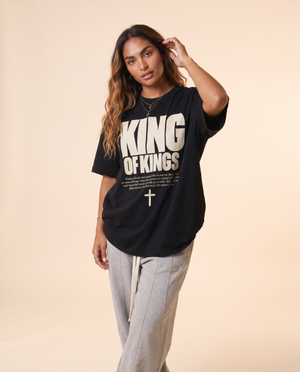 King of Kings MONOCHROME tee, black, front print, woman, hand in hair