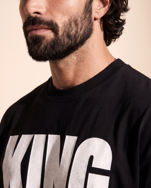 King of Kings MONOCHROME tee, black, front print, man, chest close up