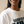 Daughter of the King MONOCHROME tee, white, woman, front print close up with gold cross necklace