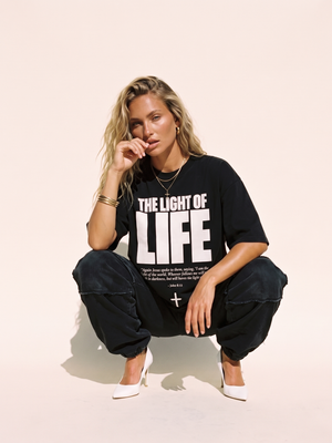 The Light of Life MONOCHROME tee, black, front print, woman, crouch full body