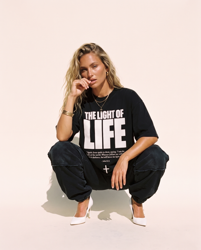 The Light of Life MONOCHROME tee, black, front print, woman, crouch full body