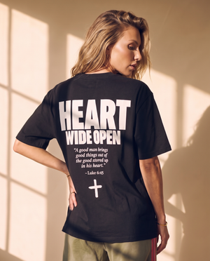 Heart Wide Open tee, black, back print edition, woman, back print hands on hips