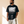 Light of the World tee, black, front print, man, look away thigh up