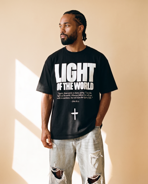 Light of the World tee, black, front print, man, look away thigh up