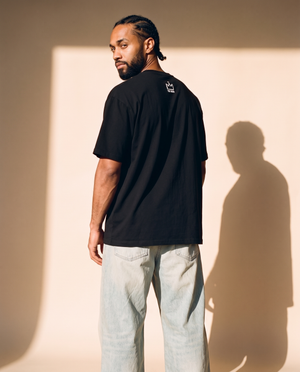 Light of the World tee, black, back print, man, back view look over