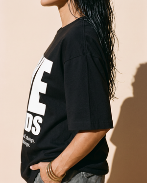 Love Never Ends tee, black, front print, woman, side close up