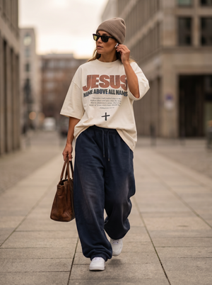 Jesus - Name Above All Names in White – Woman walking in The Word Christian T-Shirt