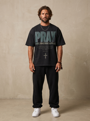 Pray Until Something Happens – Man wearing The Word t-shirt