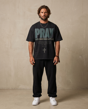 Pray Until Something Happens – Man wearing The Word t-shirt