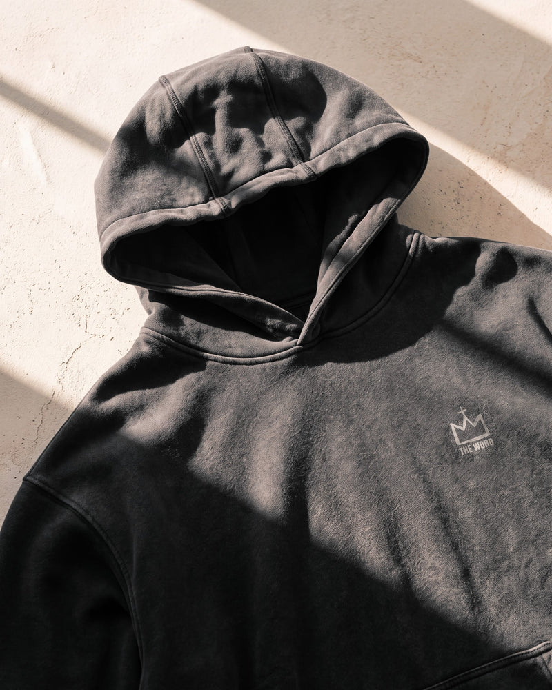 Black faded hoodie, double flatlock-seamed hood, close-up