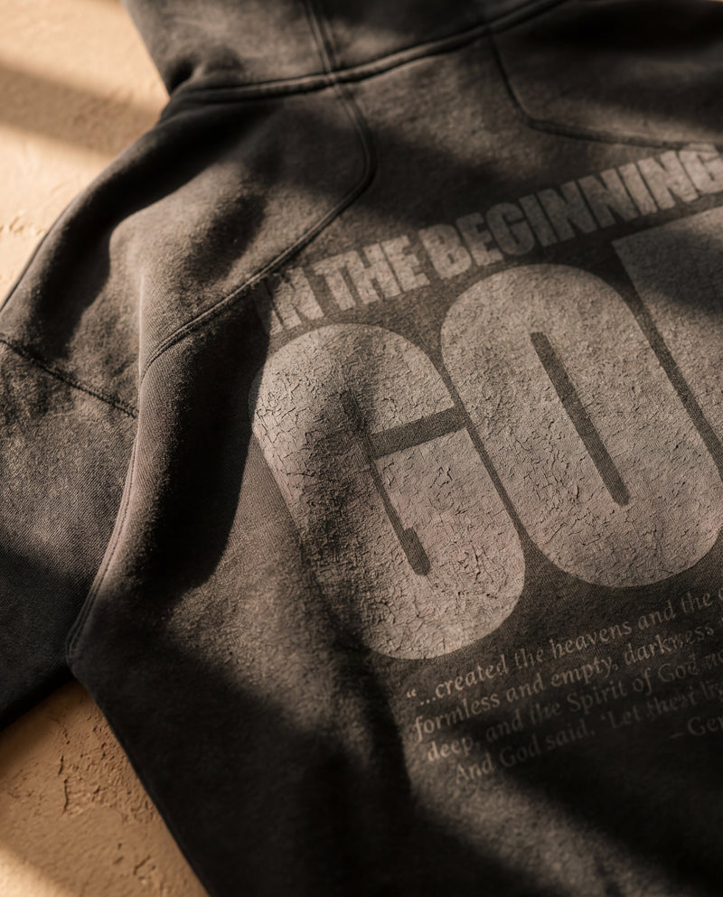 Black faded hoodie, back print and washed fabric, close-up